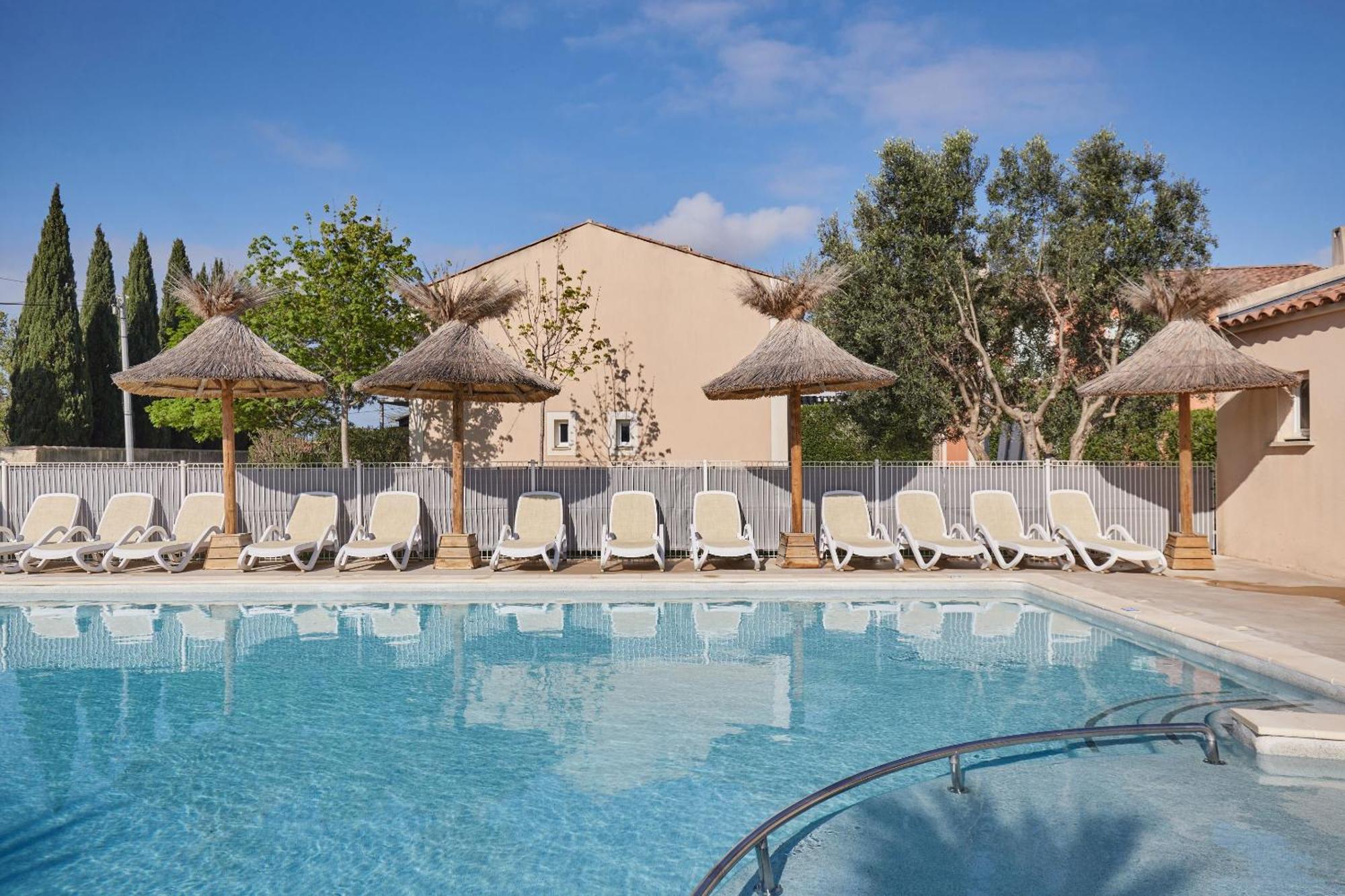 Residence Odalys Le Mas Des Flamants Aigues-Mortes Exterior foto